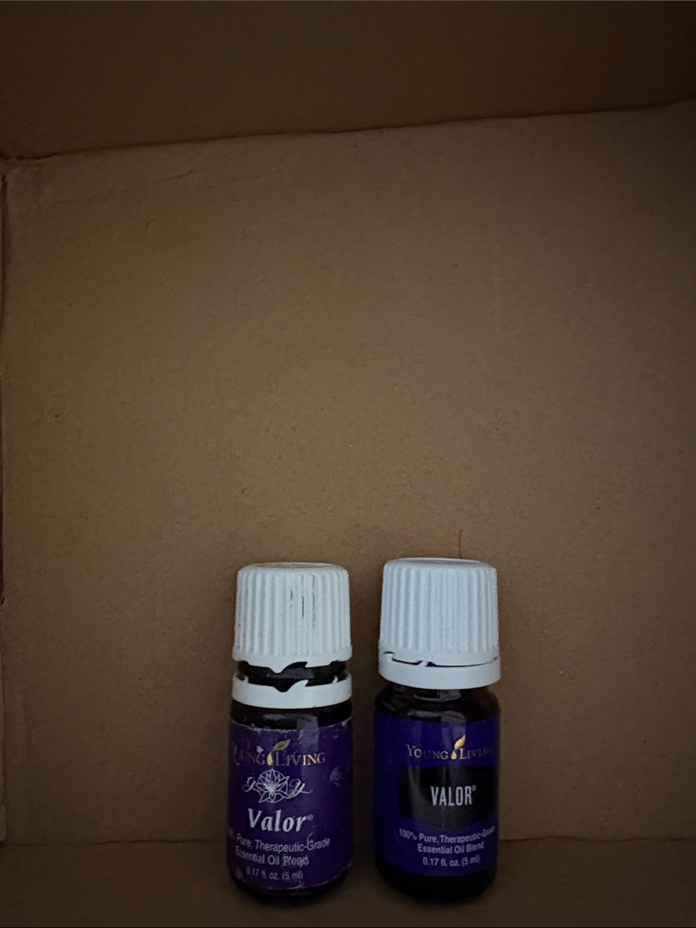Young Living Valor Essential Oil Bottles — one new and one opened full